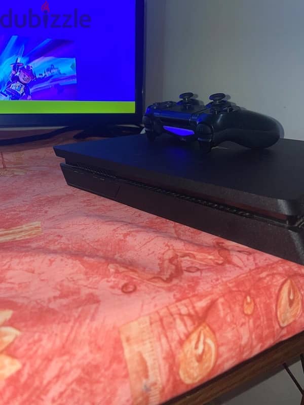 PS4 + CONTROLLER + 6 GAMES 2