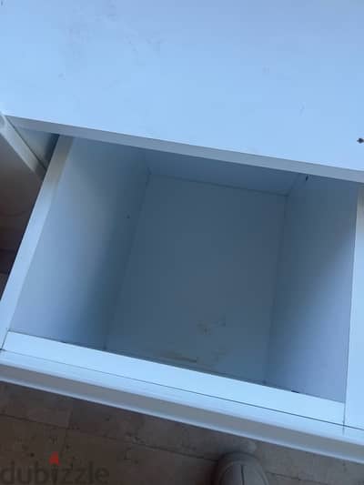 white cabinet with drawers