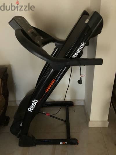 treadmill reebok like new 400$