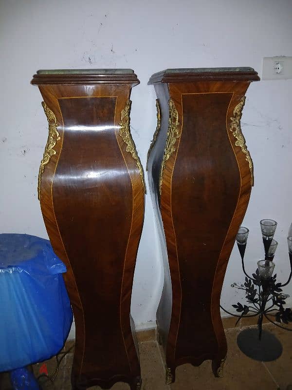 wood and marble stands 0