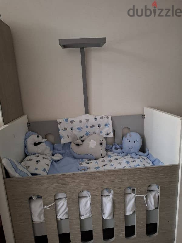 wood baby bed in a very good condition 1