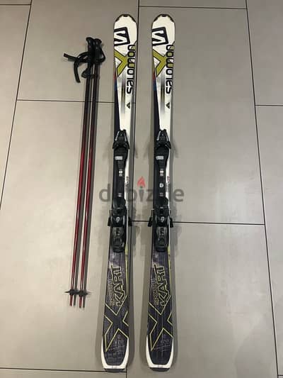 Salomon Ski and poles used 2 times