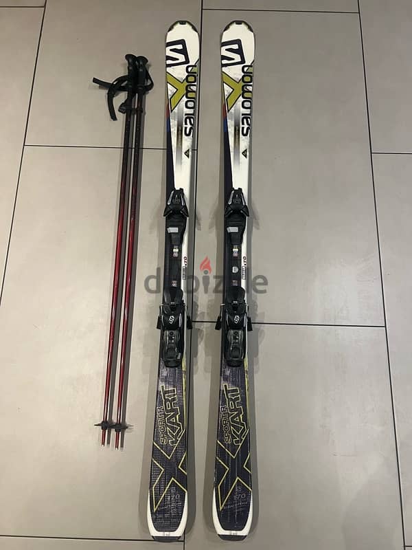 Salomon Ski and poles used 2 times 0