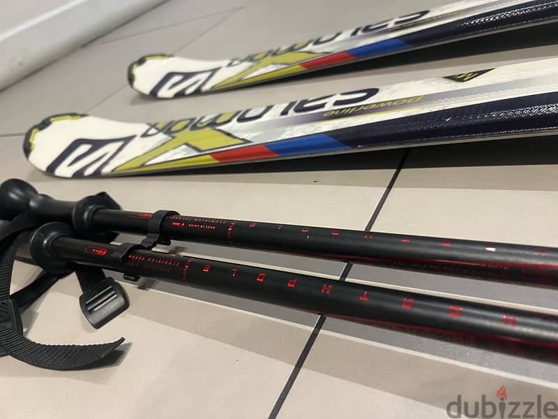 Salomon Ski and poles used 2 times 1