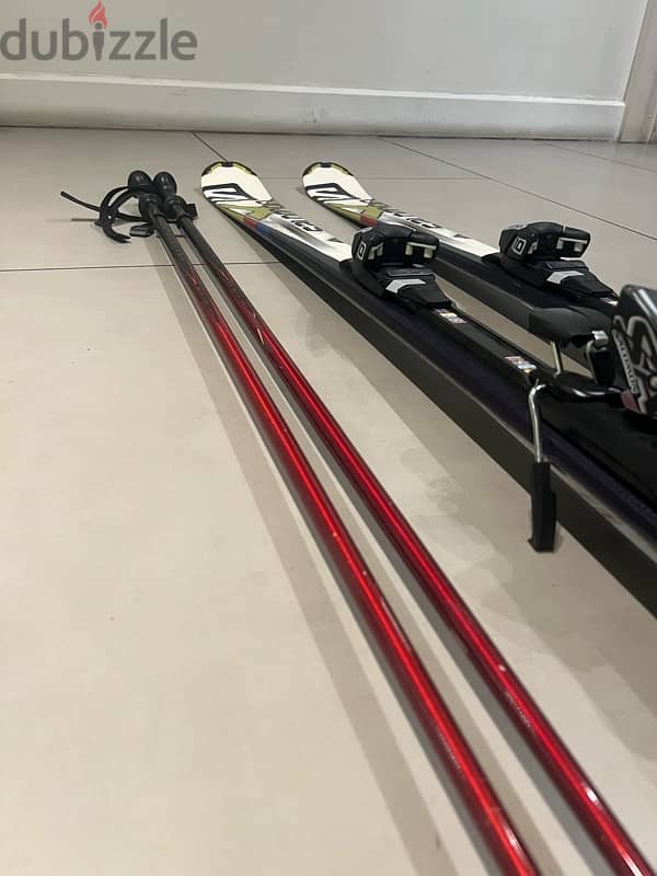 Salomon Ski and poles used 2 times 2