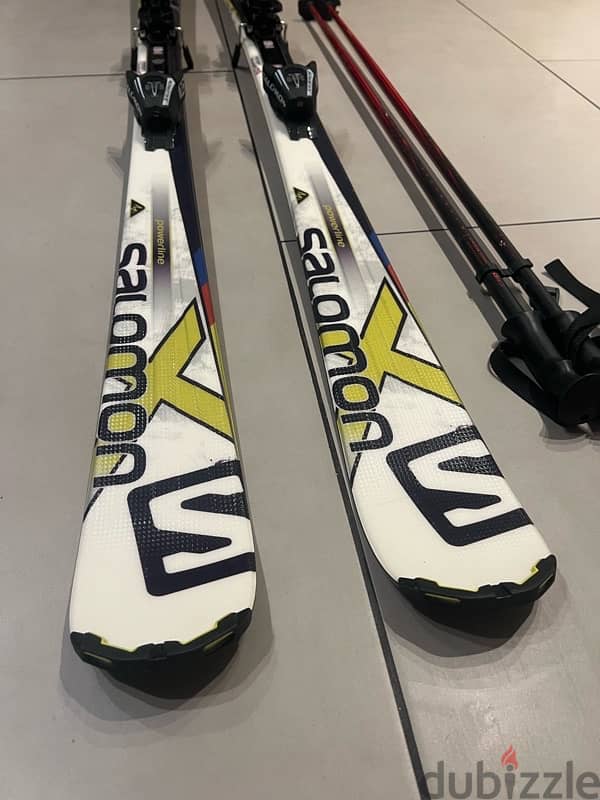 Salomon Ski and poles used 2 times 3