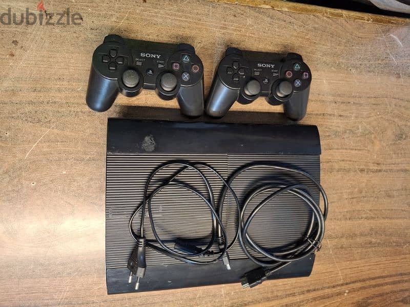 ps3 super slim and very clean with 2 controller and all cables 0