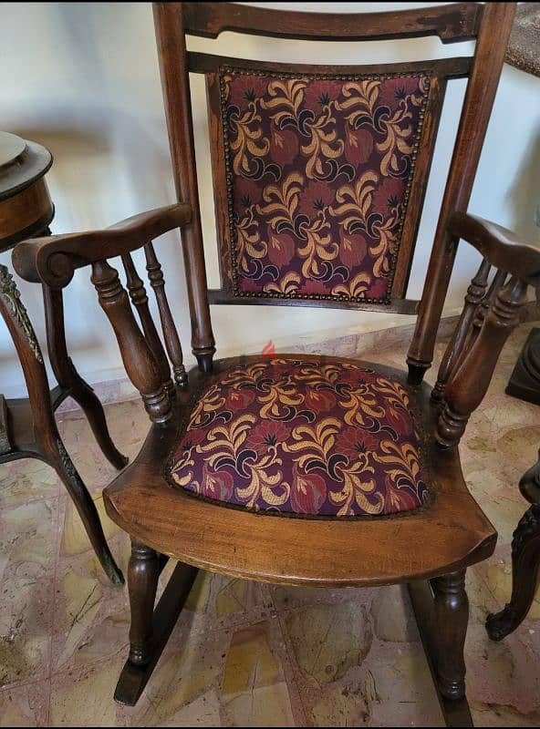 wooden swing chairs with central table 0