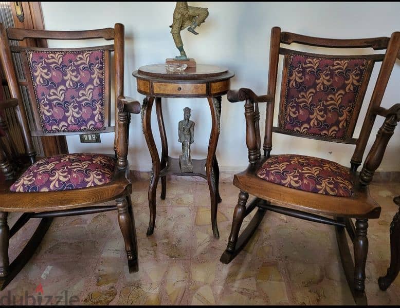 wooden swing chairs with central table 1