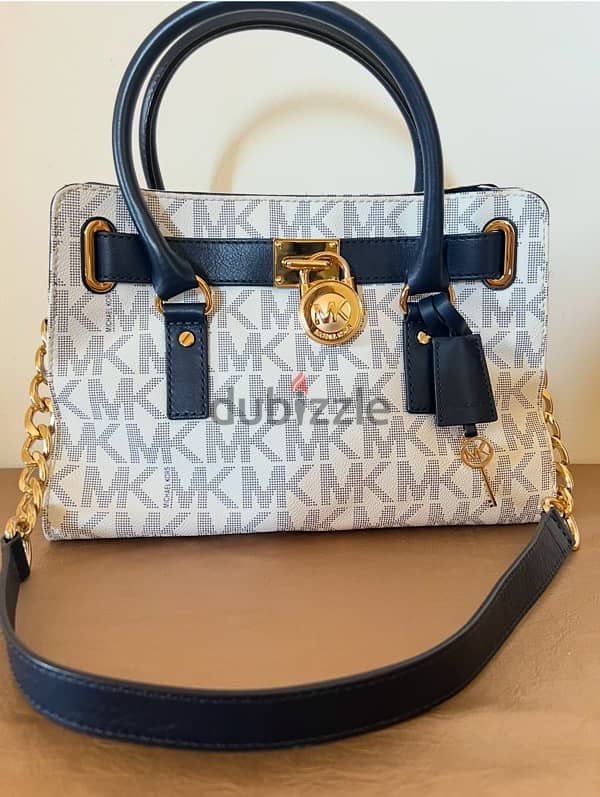 michael kors ( khle w abyad) 0