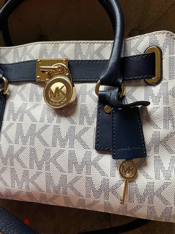 michael kors ( khle w abyad) 3