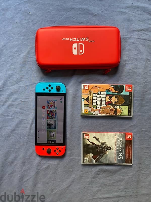 Nintendo Switch OLED (+ casing & 2 games) 1