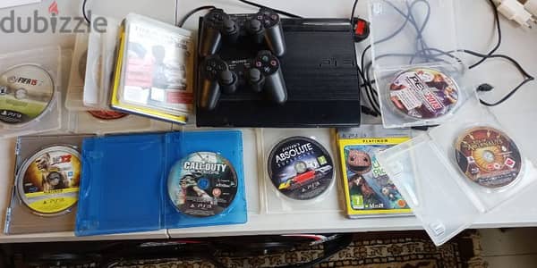 play station 3: used with 10 games