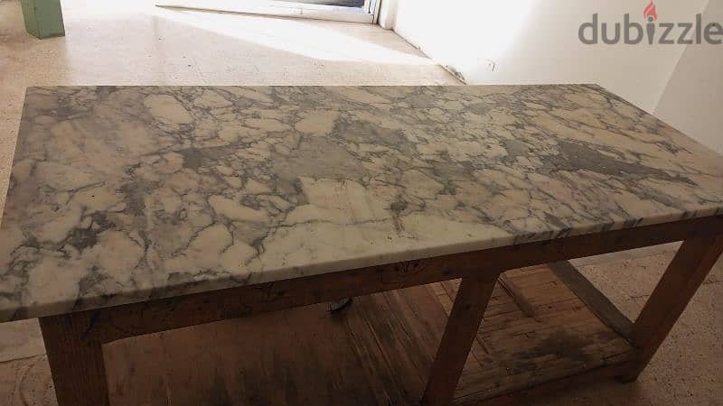 Marble table 2.5m long and 1 m width 2.5cm thick 1