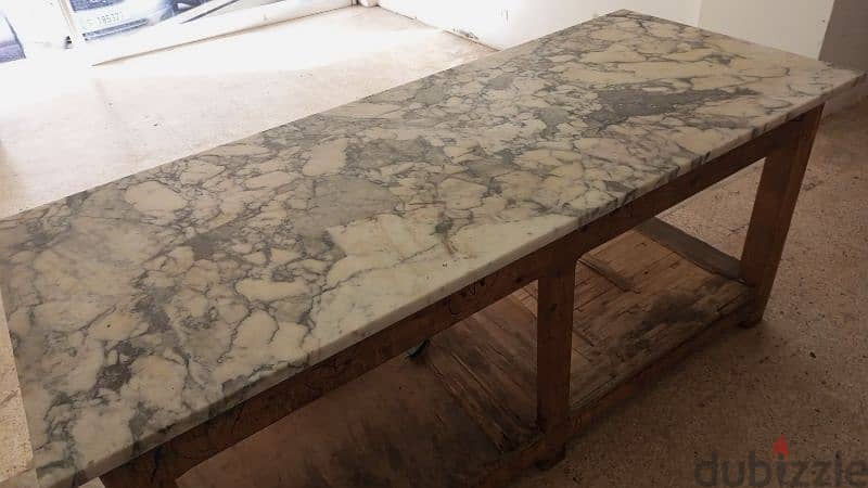 Marble table 2.5m long and 1 m width 2.5cm thick 2