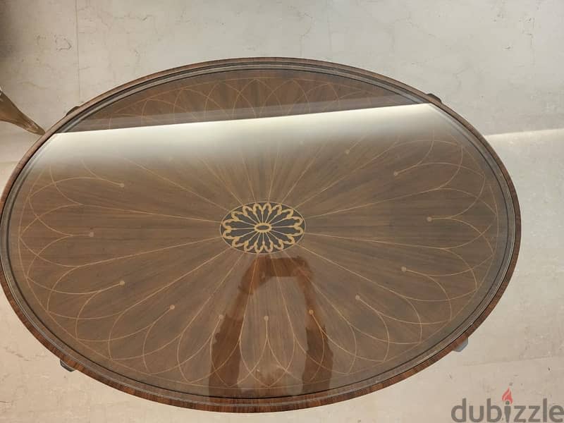 Wooden table with glass top 0