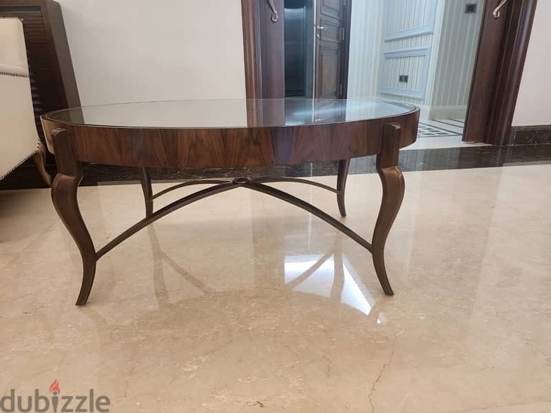 Wooden table with glass top 1