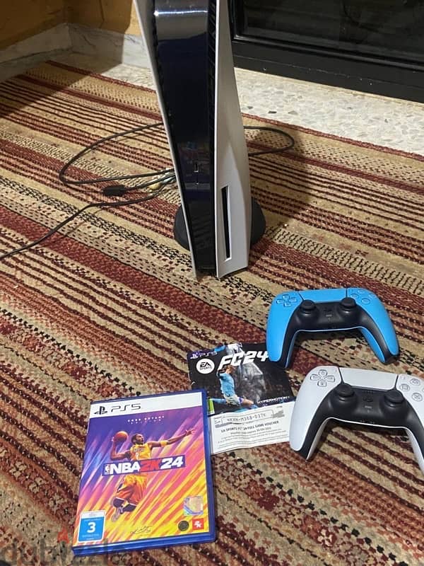 ps5 for sale 825gb with 2 original controllers and fc 24 + nba3k24 0