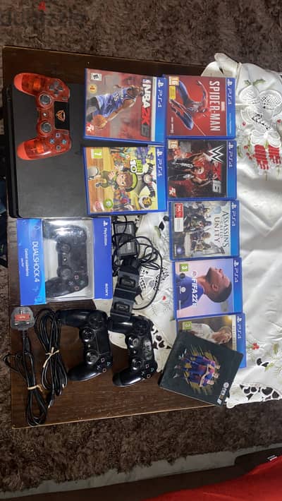 playstation 4 slim 500gb with 4 cont 7cd (controller stand original)