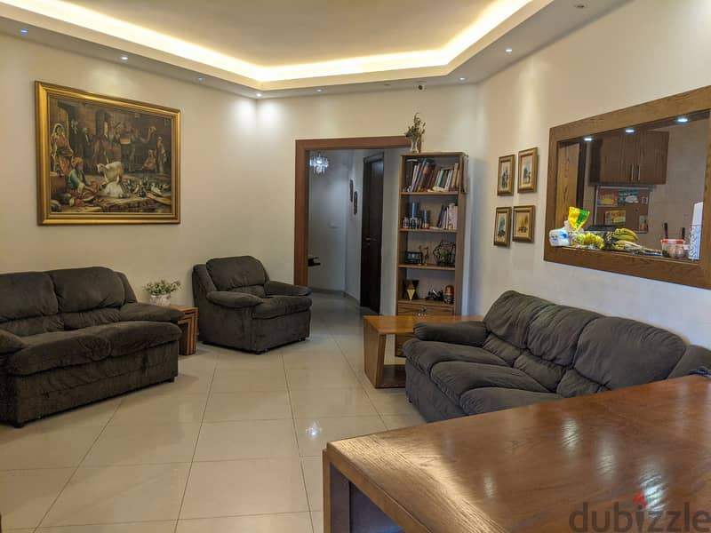 115 SQM Furnished Apartment in Aoukar, Metn with Terrace 0