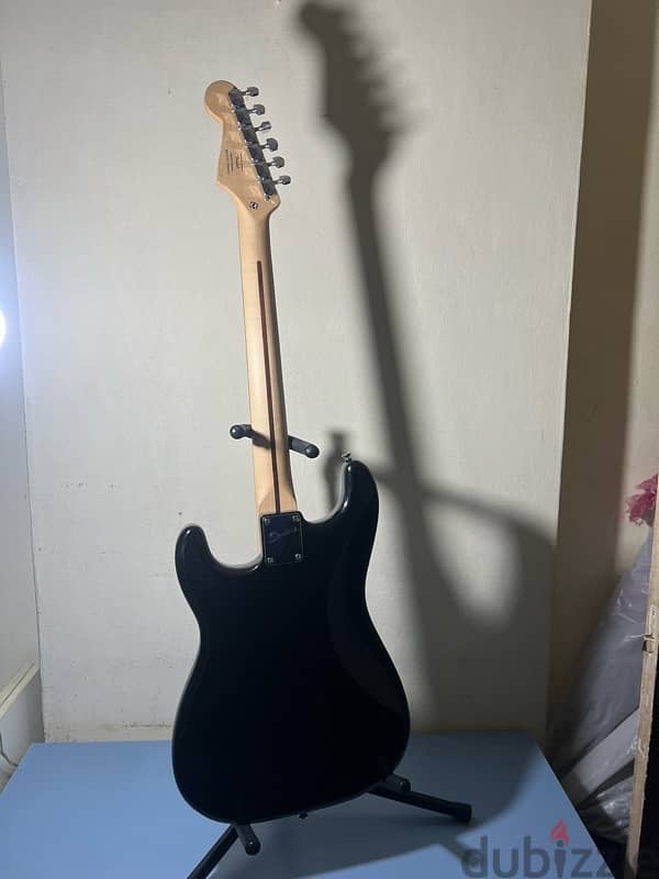 Squier by fender electric guitar 8