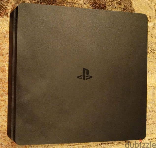 PS4 slim used like new with 4 controllers and 3 games 2