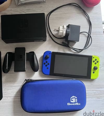 Nintendo Switch+Bag+ JoyCons+Grip,Cable,and SD Card – Great Condition!