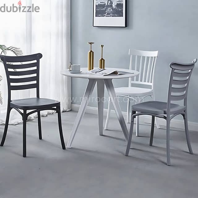 Minimalist Nordic Dining Chairs with Curved Backrest & Sleek Finish 1