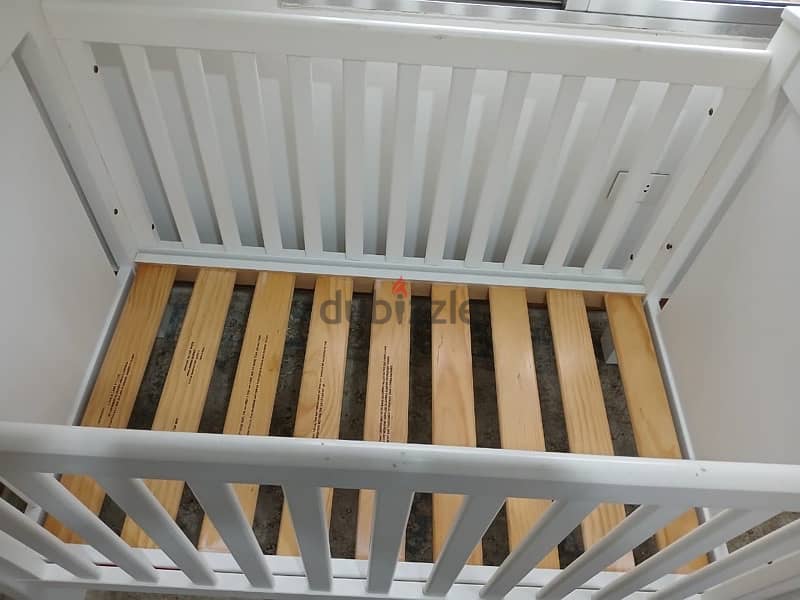 2 level crib with mattress 2