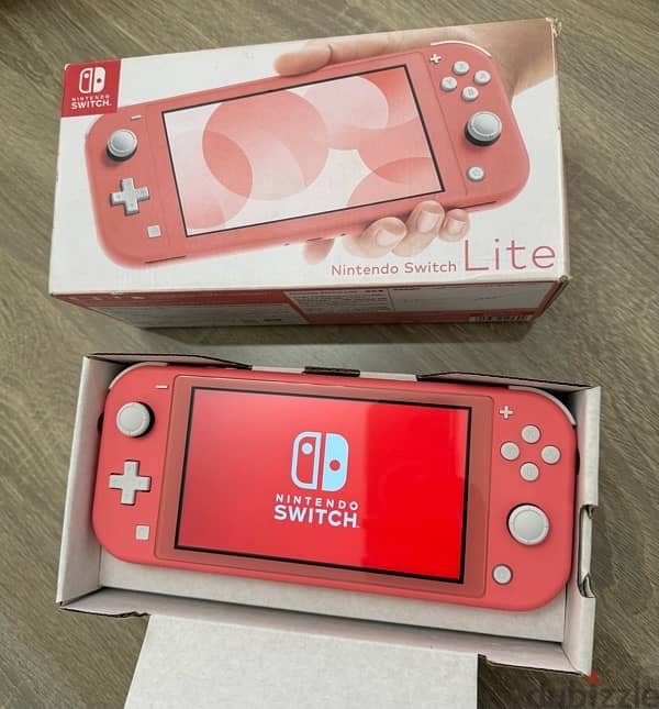 Nintendo switch lite (Used 3 days only ) 0