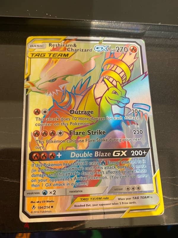 Pokémon Reshuram and Charizard GX 0