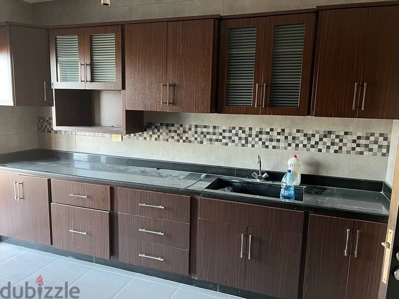 Kitchen cabinets + granite top 0