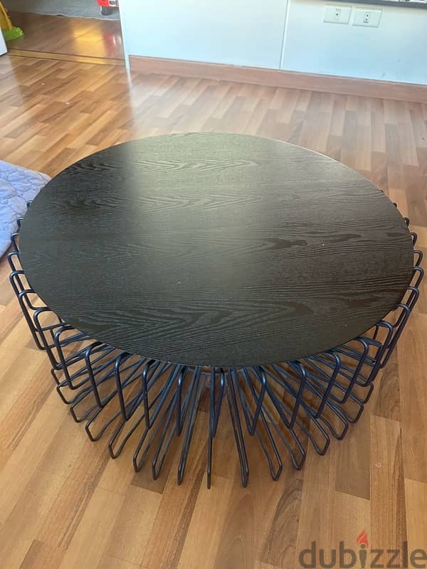 Black round table with design 0