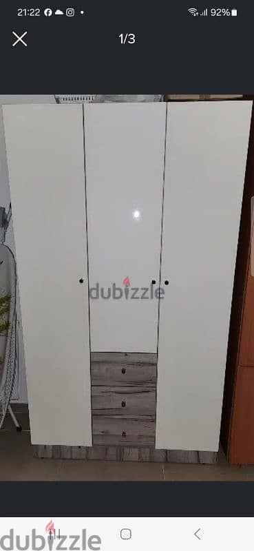 3 door closet very good condition 1