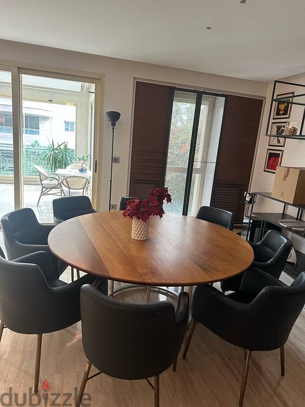 round wooden dining table with 8 chairs 3