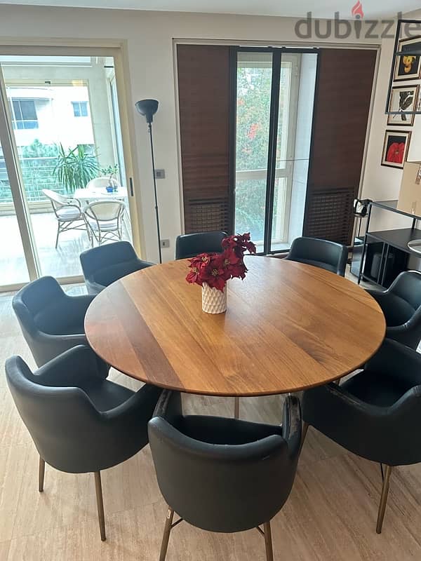 round wooden dining table with 8 chairs 4