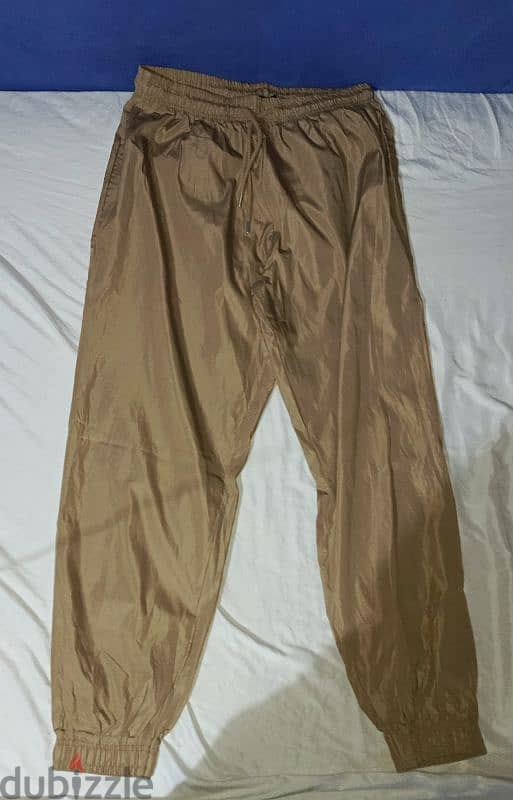 prettylittlething parachute pants cuffed beige 42 0