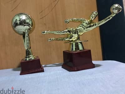 goalkeeper trophy and mini ball trophy