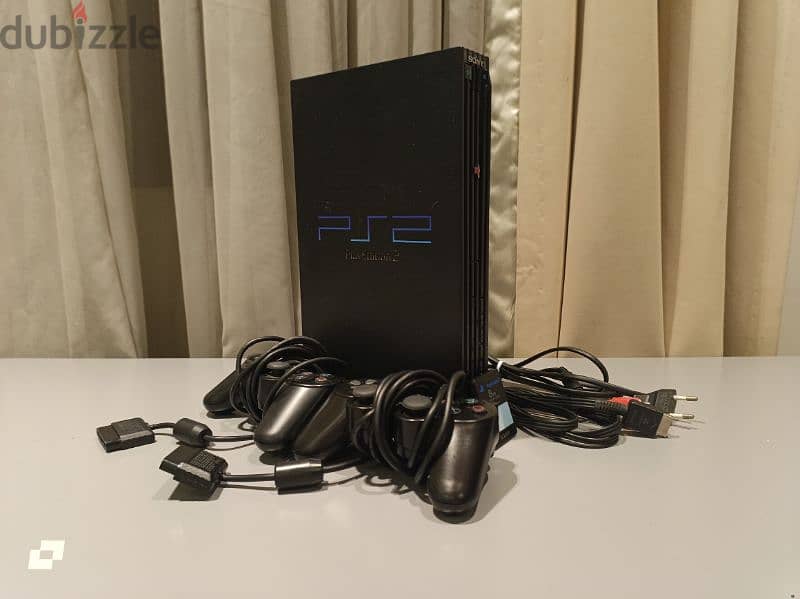 First Generation PS2 FAT + all cables + 2 controllers + 15 games 0