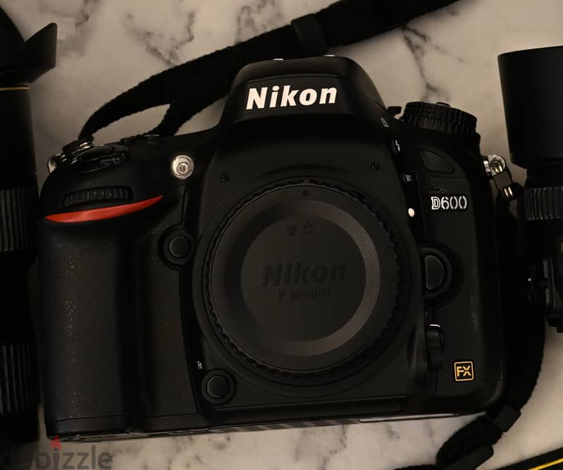 Nikon D600 + premium lenses 8,300 shutter 4