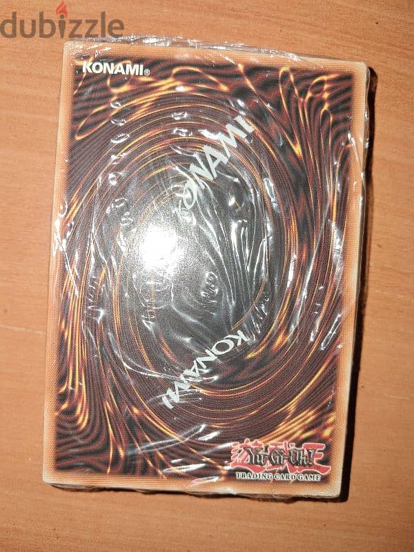 مجموعة ورق يوغي أصلية مختومة فيها secret rare 1