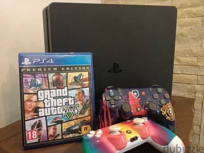 ps4 slim (used) + 2 controller and 1game