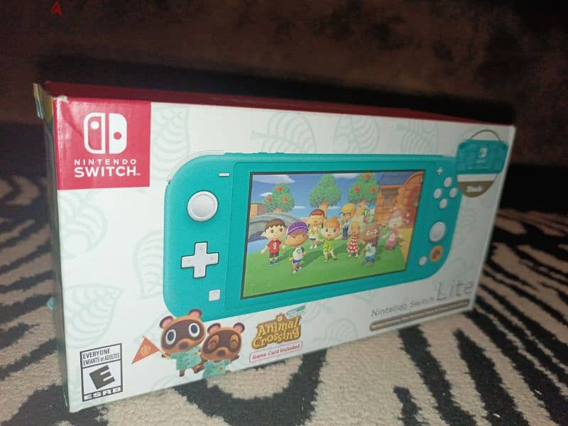 Nintendo switch lite used 3 time just like new perfect good condition 2