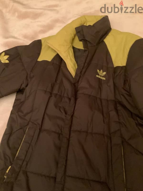 adidas skiing jacket size medium fit from 60 to 90 kilo 1