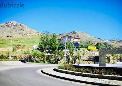 EXCEPTIONAL LAND In FAQRA with PANORAMIC View أرض في فقرا ٦٨٠ م٢