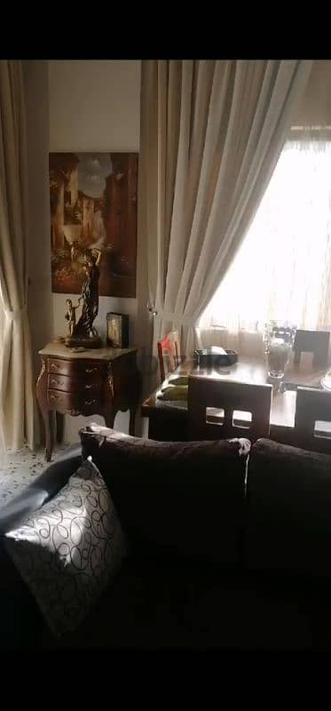 apartment For sale in amchit شقة للبيع في عمشيت