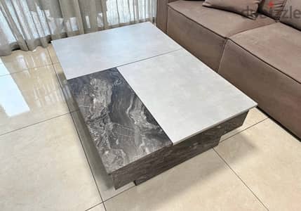 Big coffee table with storage mechanism