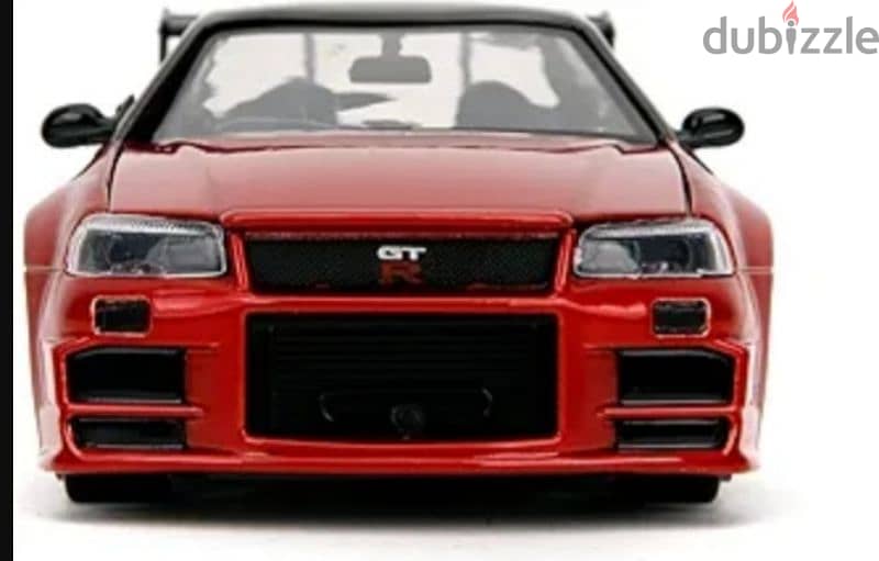 Nissan Skyline GT-R (R34) diecast car model 1:24. 2