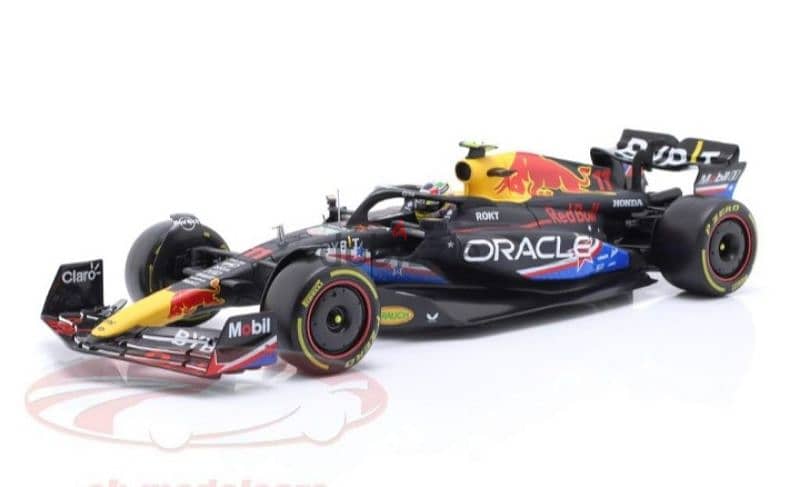 S. Perez Red Bull RB19 (GP USA 2023) diecast car model 1;18. 1