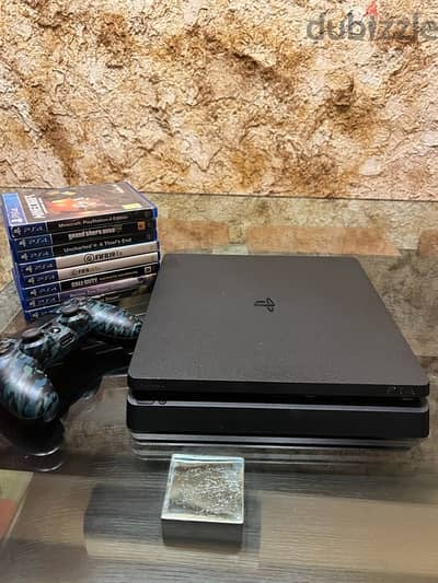 very clean ps4 with 8 games and a controller